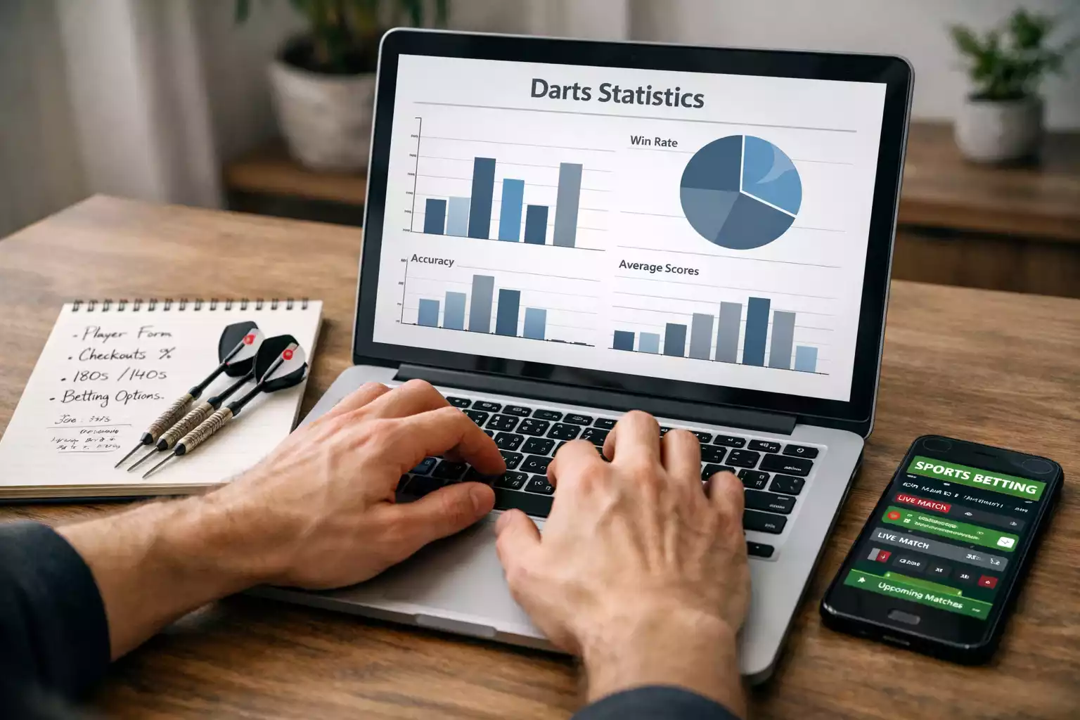 Persoon analyseert dartsstatistieken op laptop